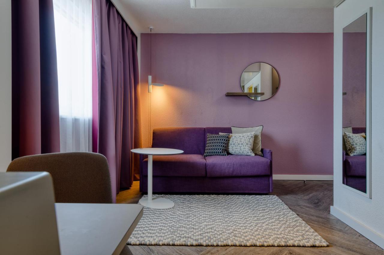 Suite met 2 Slaapkamers met Tweepersoonsbed en Bank