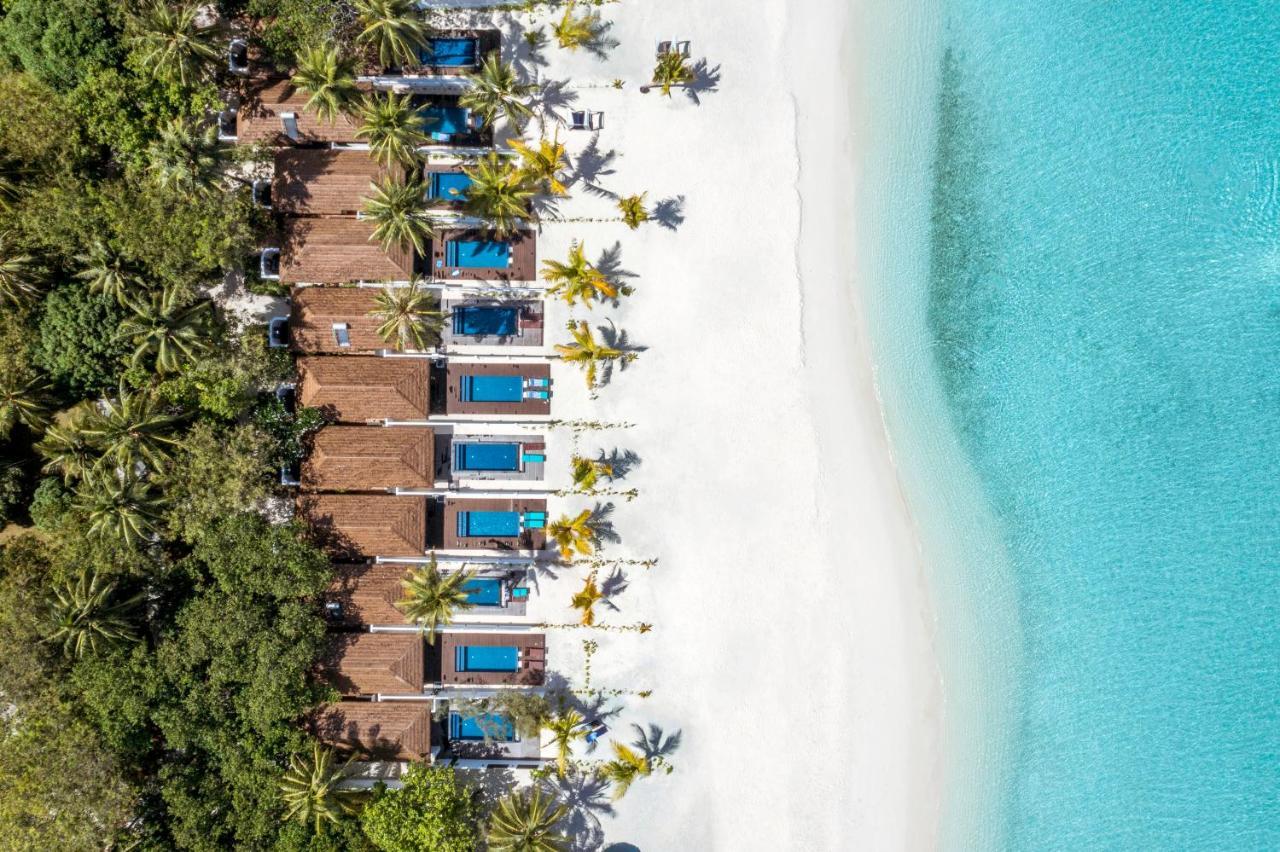 Villa sulla Spiaggia con Piscina e Vista Tramonto
