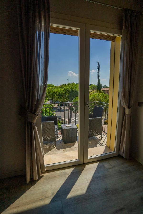 Camera Tripla con Balcone