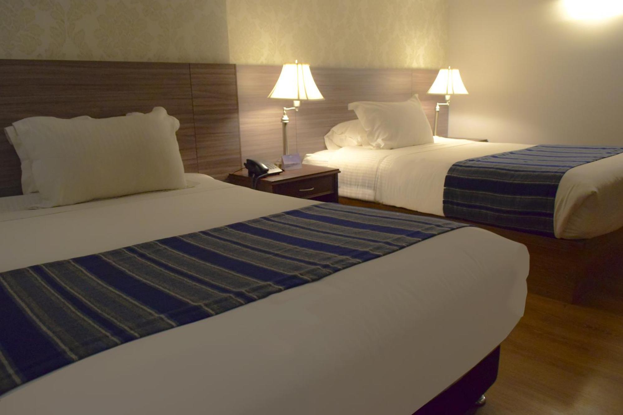 Quarto Superior com 2 Camas de Solteiro