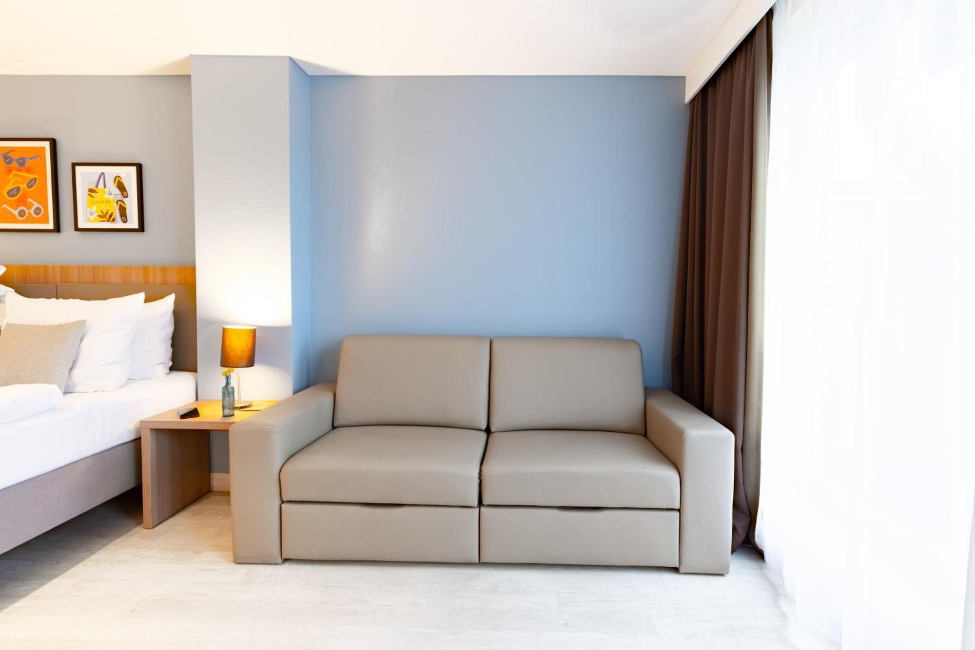 Premium King Kamer met Slaapbank