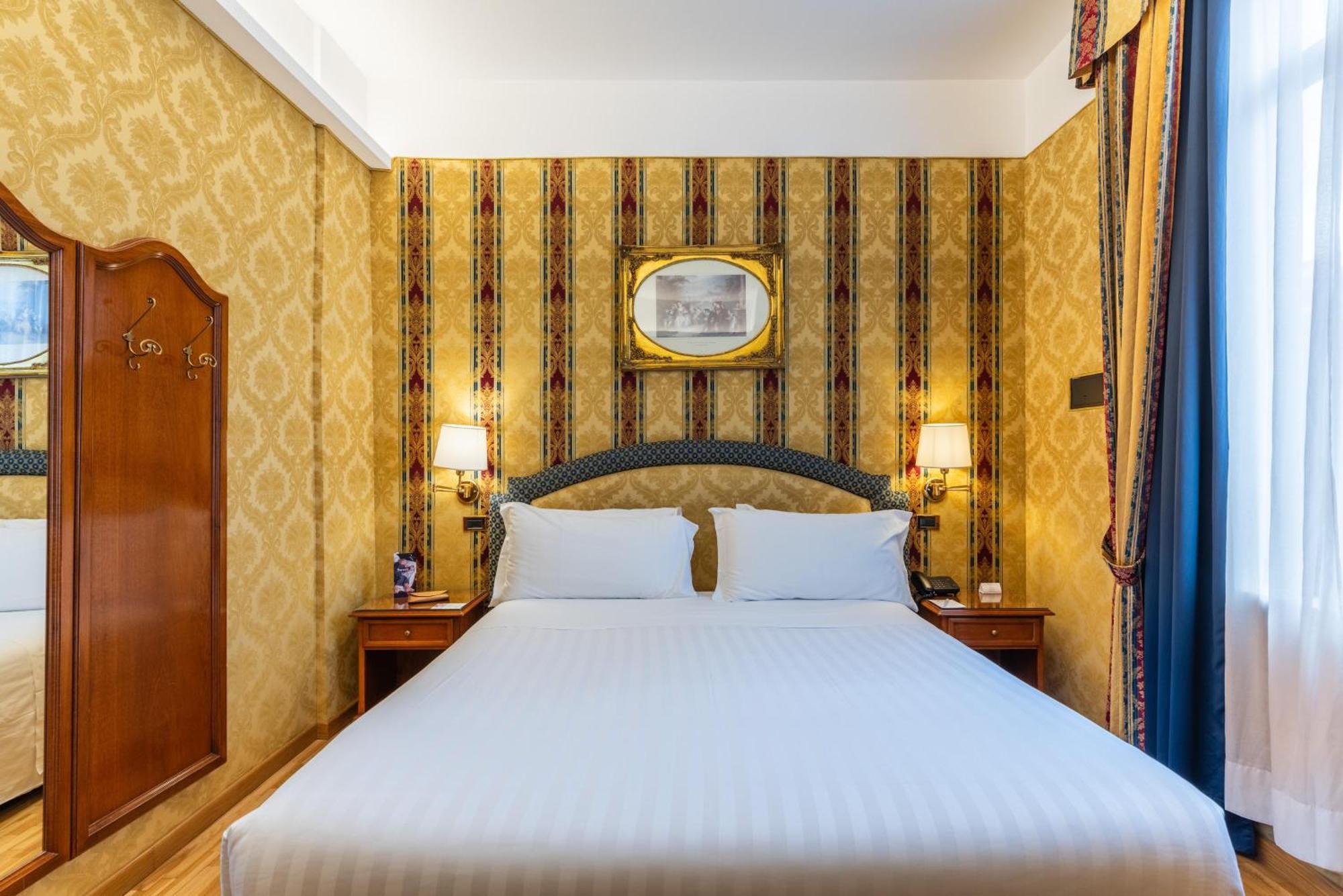 Economy room with double bed and internal window to corridor,1742587020:JPEG
