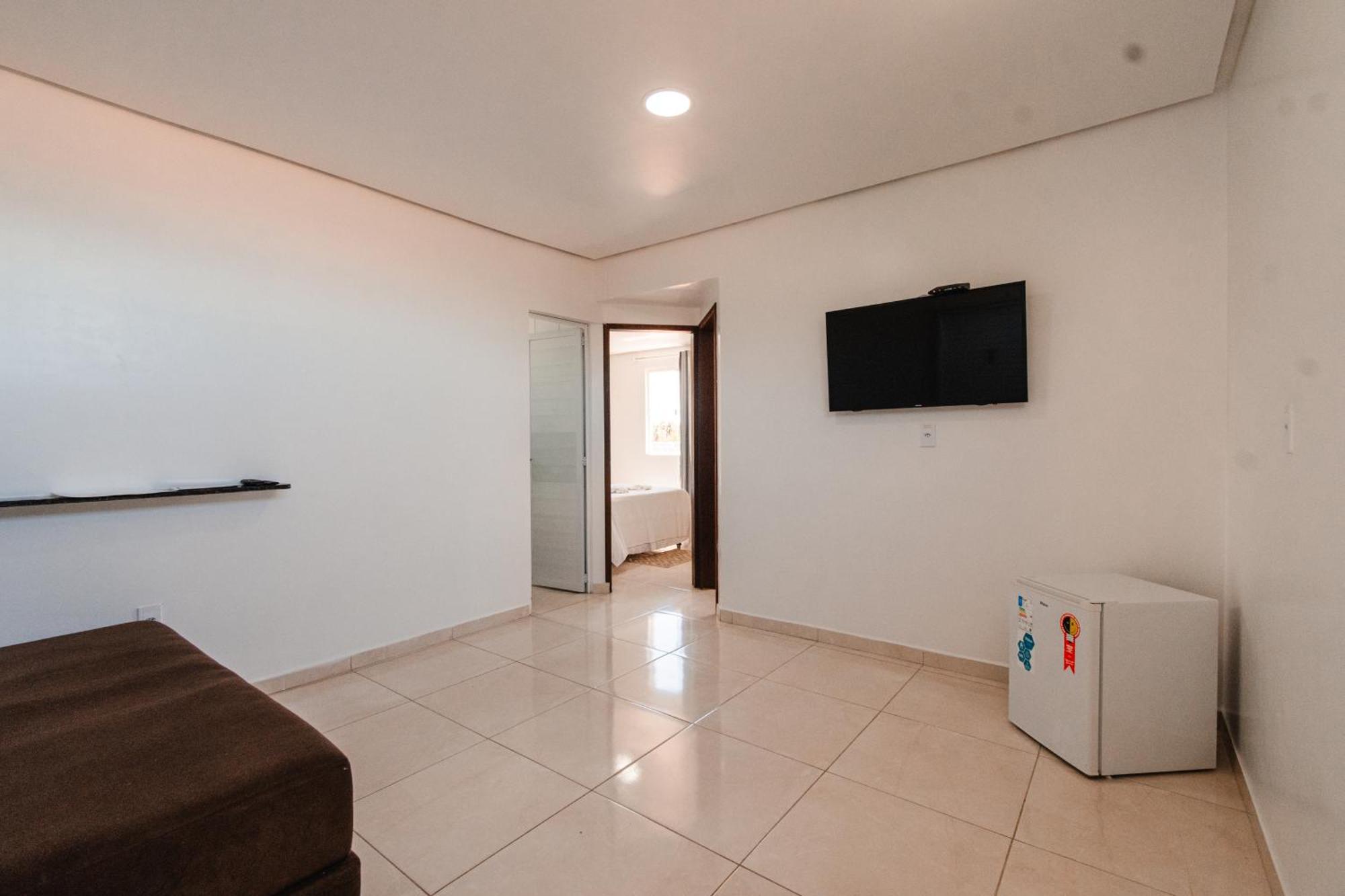 Quarto Quádruplo Premium
