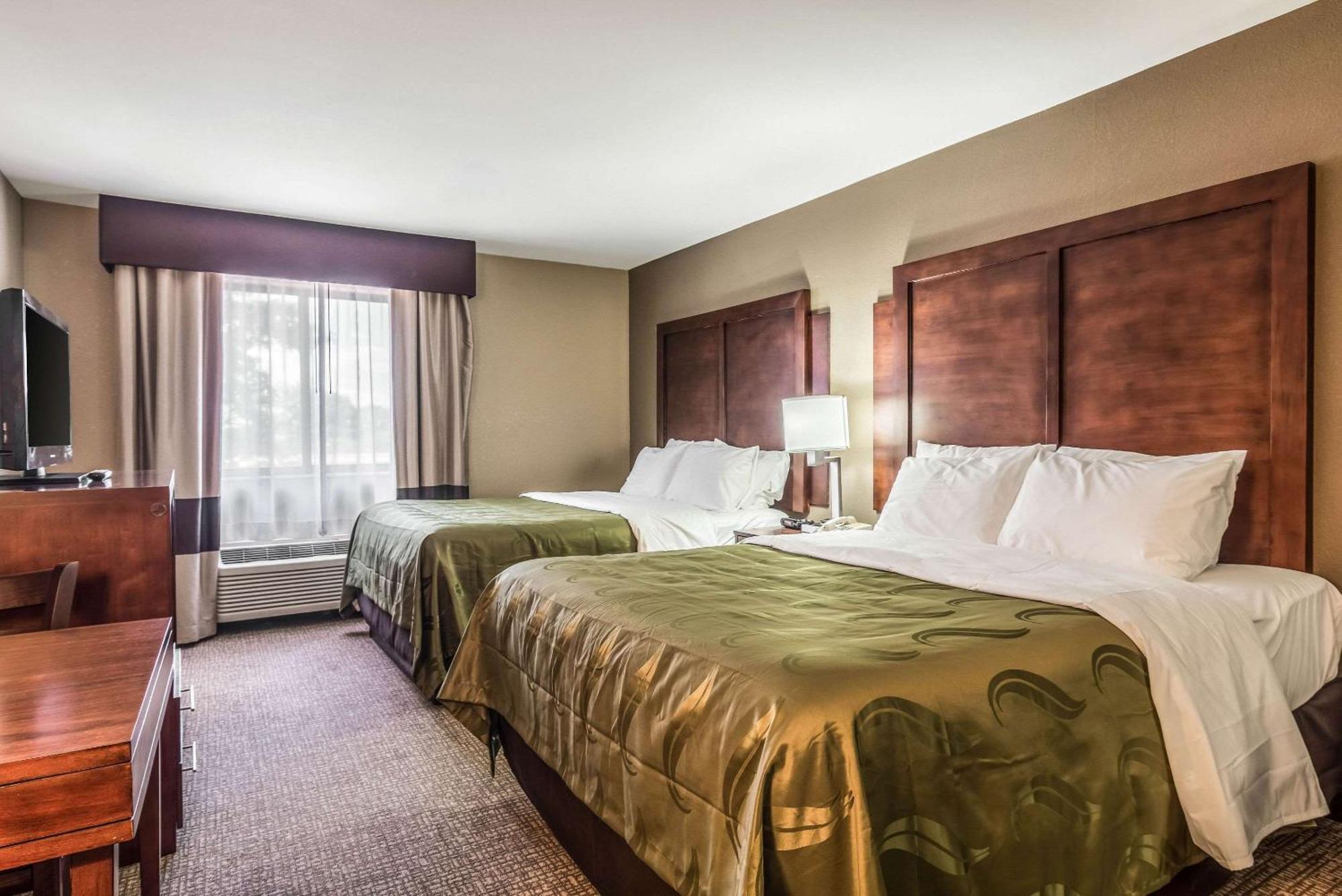Queen Suite with Two Queen Beds and Sofa Bed
