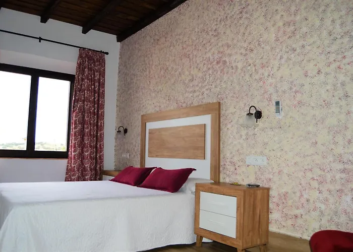 Apartamentos Turísticos - Hostal Los Alisos